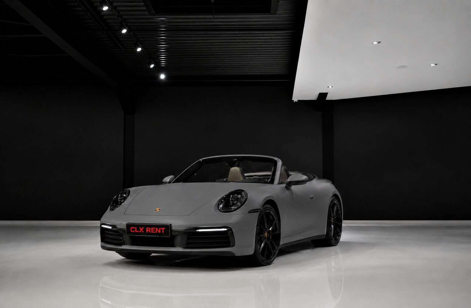 Porsche 911 cabrio grigia vista anteriore noleggio Torino